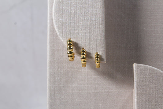 Shiny gold hoops